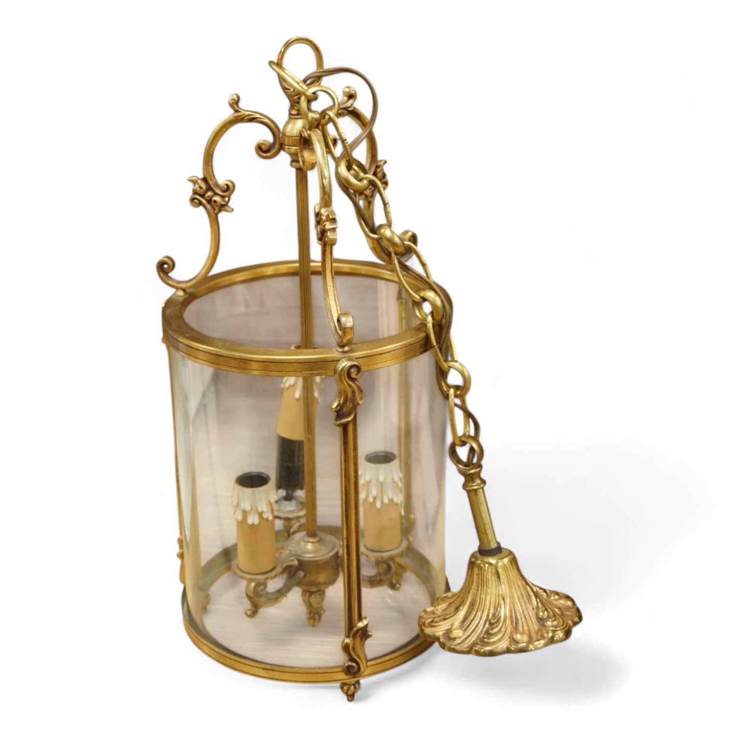 A cylindrical brass hanging hall lantern, 86cm high overall